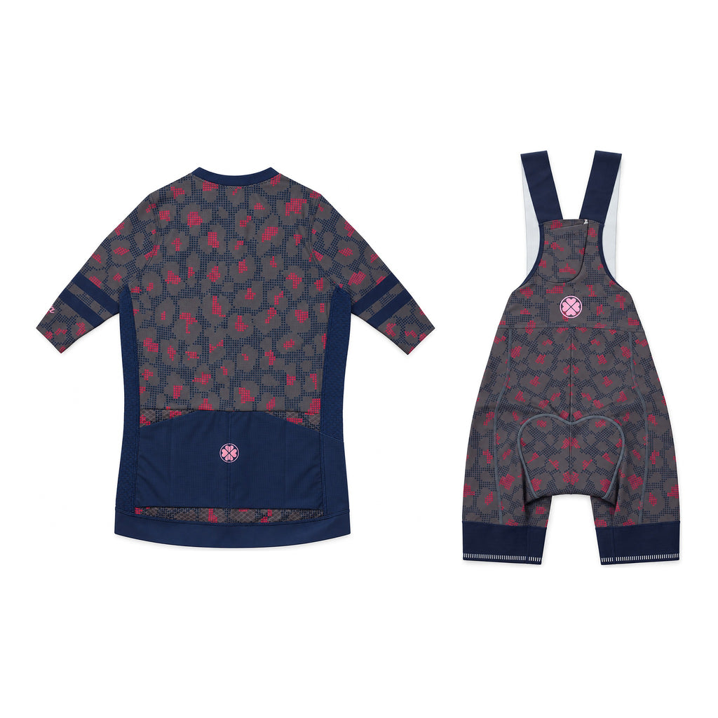 Gray Kittie kit: jersey and bib shorts, flat-lay back