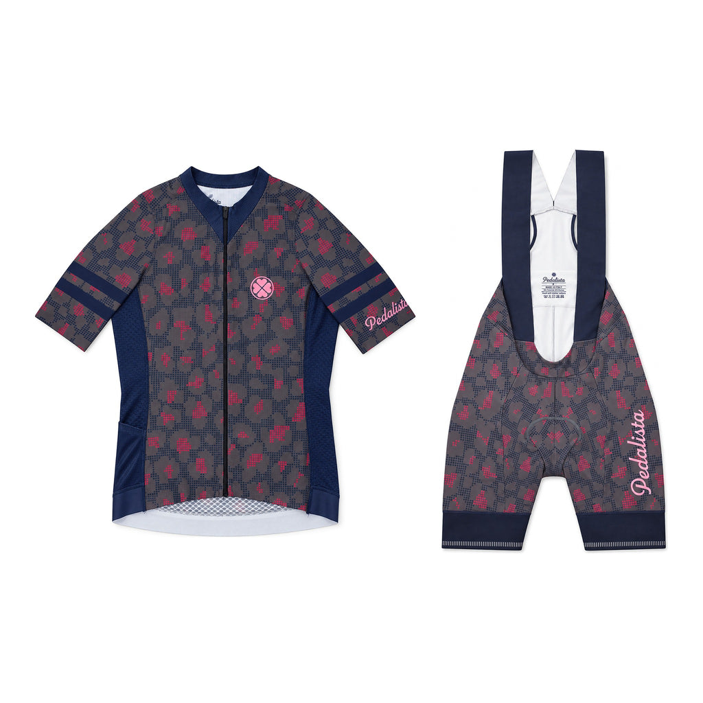 Gray Kittie kit: jersey and bib shorts, flat-lay front