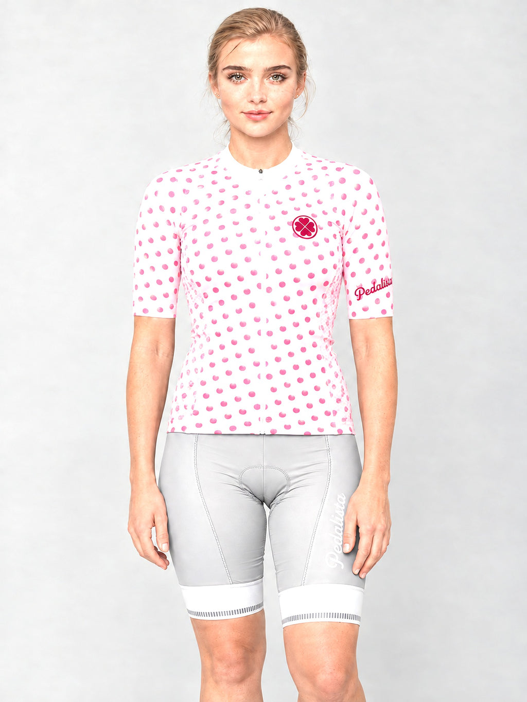 Model wearing the Queen of the Mountain jersey with silver bib shorts, front view