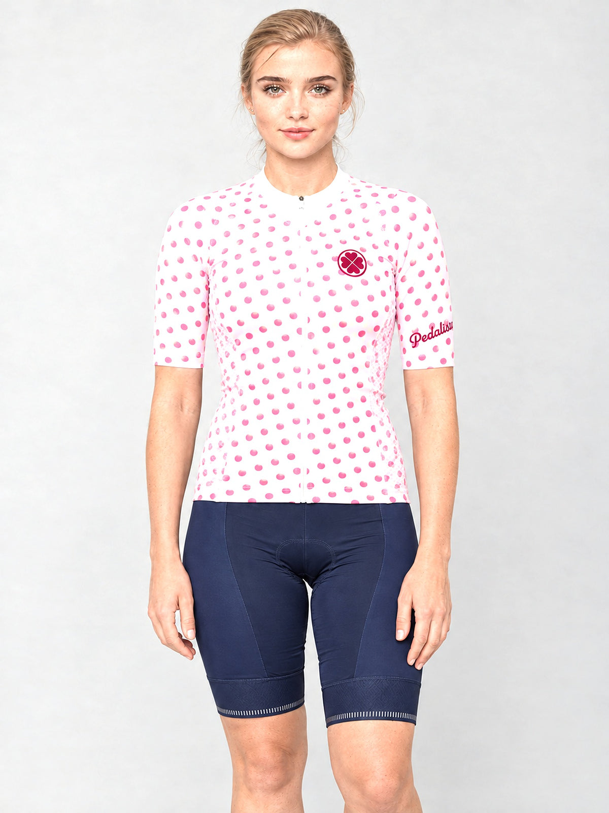 Model wearing the Queen of the Mountain jersey with navy bib shorts, front view