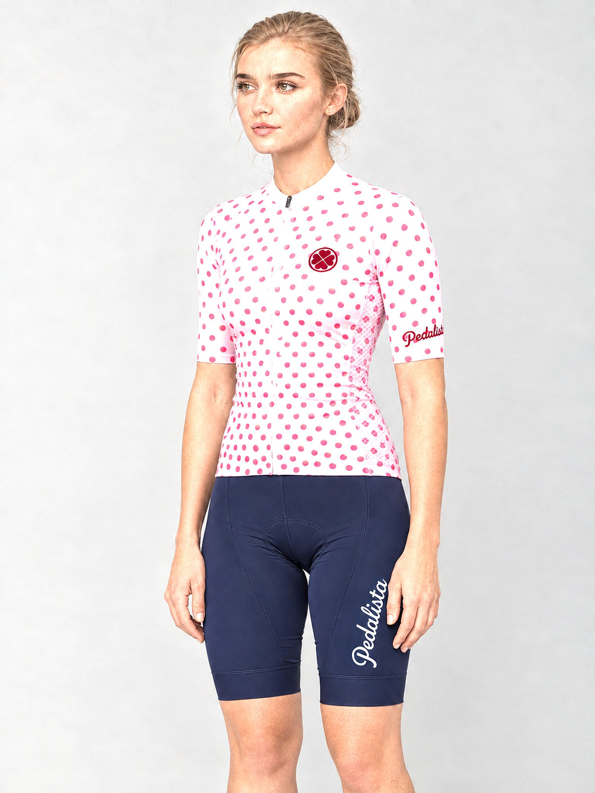 Model wearing the Queen of the Mountain jersey with navy bib shorts, side view