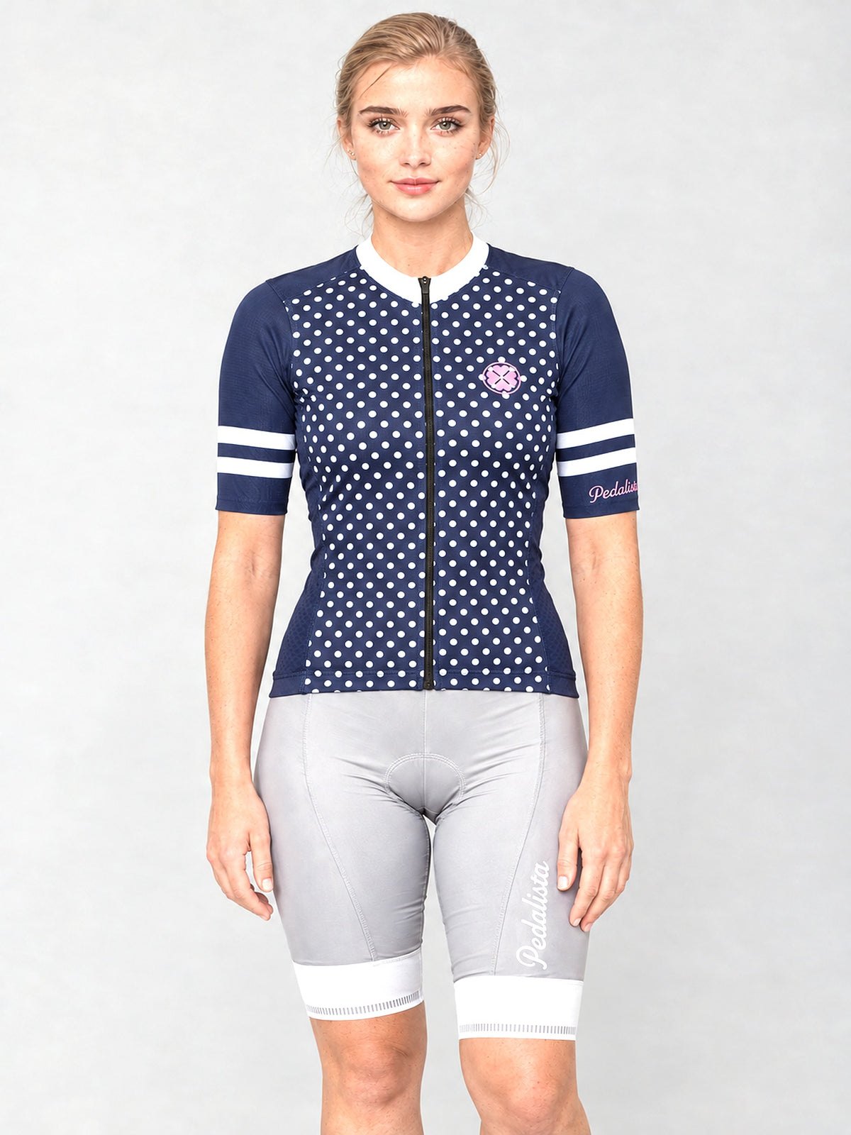 Model wearing The Jackie jersey with silver bib shorts, front view